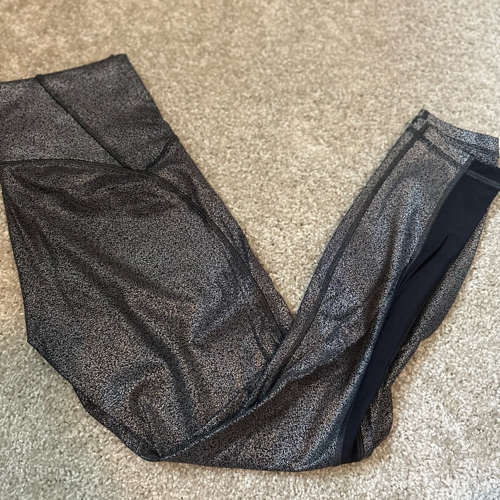 Lululemon shiny leggings with mesh detail up thigh
